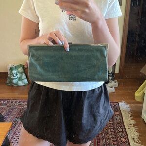 HOBO international teal leather clutch with silver hardware